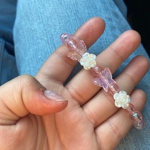 1$ bracelet pink and white with butterfly and roses